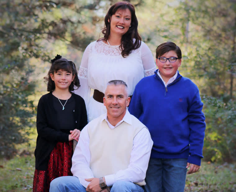 Hank Martinez, owner of Cypress Construction, with his family